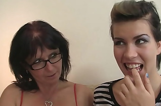 Older woman teaching girl licking pussy