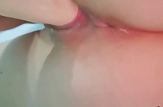 AUBREY FROST gripping her warm juicy creamy pussy lips on a massive dildo