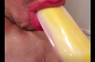 Sucking banana penis toy