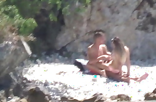 Couple enjoy private beach