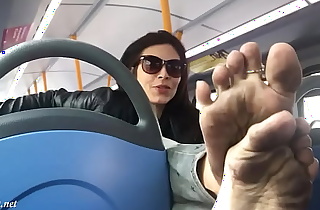 Stranger teasing with her dirty feet during bus ride and gets cum on them