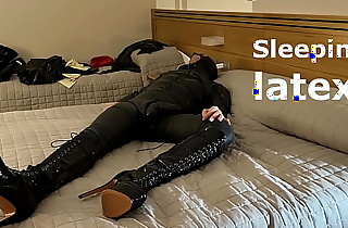 Sleeping wearing latex and high boots