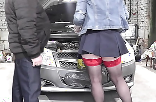 Sexy MILF Frina works in car service. Nude car servise. Naked blonde in car repair shop repairs client auto. No panties under skirt. Without bra. Without panties. Natural tits. Pussy MILF. High heels. Stocking