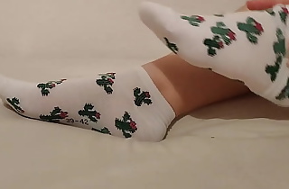 Girl taking off her socks