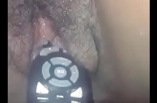 Zambian teen inserting a Gotv remote