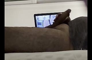 Giving pleasure to my uncut cock on my bed