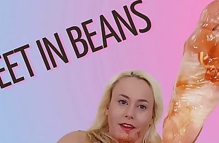 Sexy feet in beans and sausages