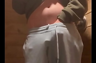 pissing in sweat pants