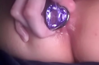 Watch tiny teen pull her buttplug out