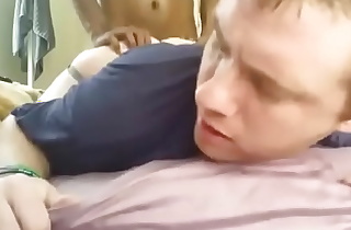Up close face view of a young 18yo White boy enjoying Interracial sex with a hung Black man