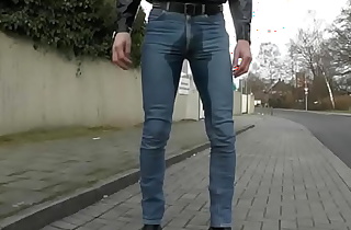 wetting tidy jeans on the street