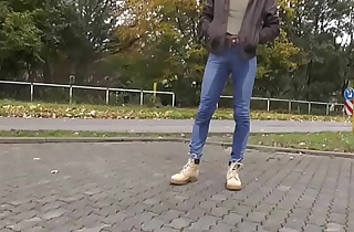 pissing in jeans on public road
