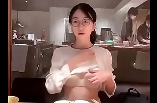 Asian flashing tits in restaurant