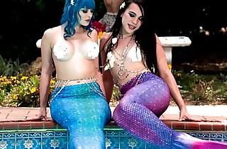 Jewelz Blu makes the perfect mermaid to be fucked by another tranny mermaid named Kasey Kei. Watch them as they reveal what's hidden behind their legs