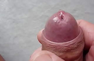 Cock play with precum and foreskin withdrawal
