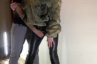 Hot passionate standing fuck in clothes, fur coat, leather legging, leather high heels