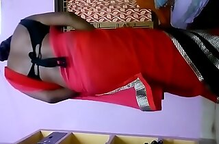 Deepika bhabhi in red hot saree shaking ass in her home