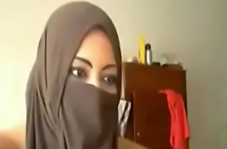 Chubby Arab GF plays with her tits and pussy