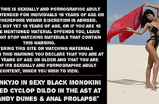 Hotkinkyjo in sexy black monokini in the matter of red cyclop sex-toy in the ass at the granular dunes  increased by anal prolapse