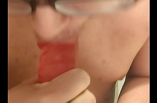 Sucking a big dildo