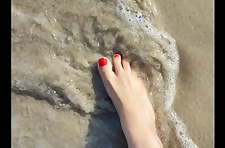 Footisha feet overhead along to beach