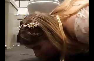 Skunk Along to Floor Of A Public Toilet