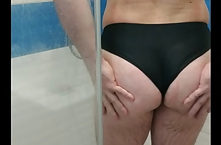 Sexy tranny wearing one piece swimsuit and jerking
